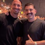 Andrew Schulz Instagram - Finally connected with my cousin @iamzlatanibrahimovic at UFC 294 🎥 @valafilms Etihad Arena