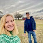 Angela Kinsey Instagram - So happy to be on our family farm! 1-Walking from my sister’s house to my Mom’s house to exchange Christmas gifts. 2-Tree kitty & Cade 3-The kids & the Labs! 4-Christmas tree napkins made by my Mom 5-Evening walk with Josh in the back pasture 6-Me & Caroline the cow dog 7-Sunset from Mom’s front porch. ❤️