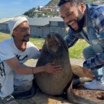 Anthony Anderson Instagram - When you wake up and take an adventure with your brother from another mother @deecamzi It was a great day. I did everything but kiss the seal! We went thru Chapmans peak on the way to cape point. #justakidfromcompton #fromcomptontocapetown #huskyandhandsome #acbarbeque Tamboerskloof, Western Cape, South Africa