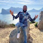 Anthony Anderson Instagram - When you wake up and take an adventure with your brother from another mother @deecamzi It was a great day. I did everything but kiss the seal! We went thru Chapmans peak on the way to cape point. #justakidfromcompton #fromcomptontocapetown #huskyandhandsome #acbarbeque Tamboerskloof, Western Cape, South Africa