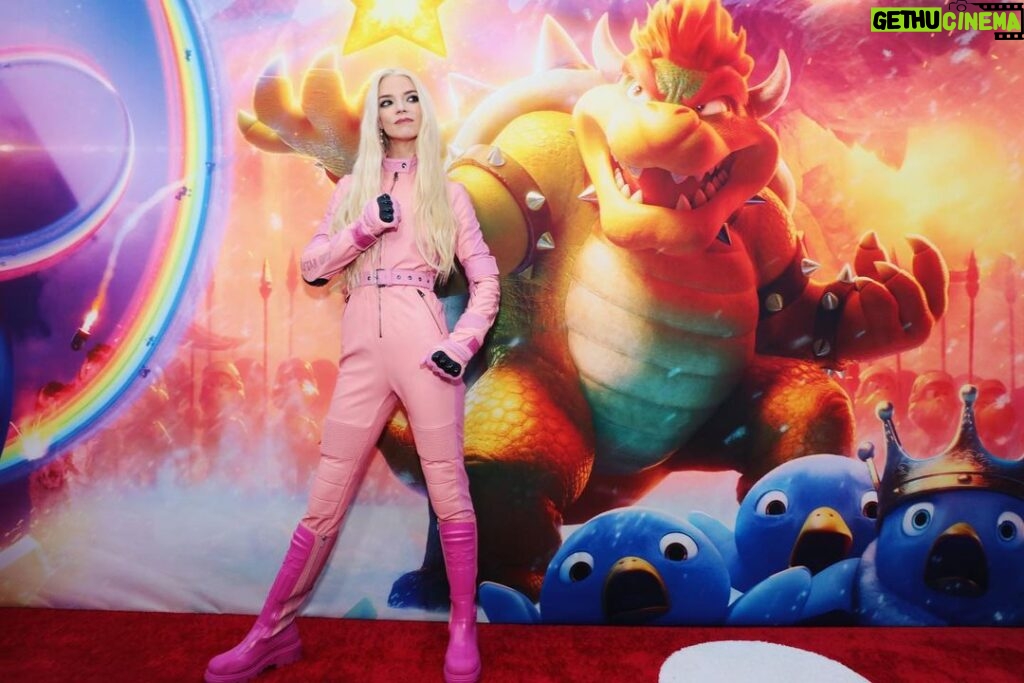 Anya Taylor-Joy Instagram - 🍑Peach came to play🍑 So wonderful celebrating @supermariomovie with so many of you :) Big love to @illuminationent @universalpictures , Nintendo and our beautiful cast… and @dior for making me Peachs’ moto suit! Beep beep loveees 🏍 Out April 5th✨