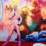 Anya Taylor-Joy Instagram - 🍑Peach came to play🍑 So wonderful celebrating @supermariomovie with so many of you :) Big love to @illuminationent @universalpictures , Nintendo and our beautiful cast… and @dior for making me Peachs’ moto suit! Beep beep loveees 🏍 Out April 5th✨