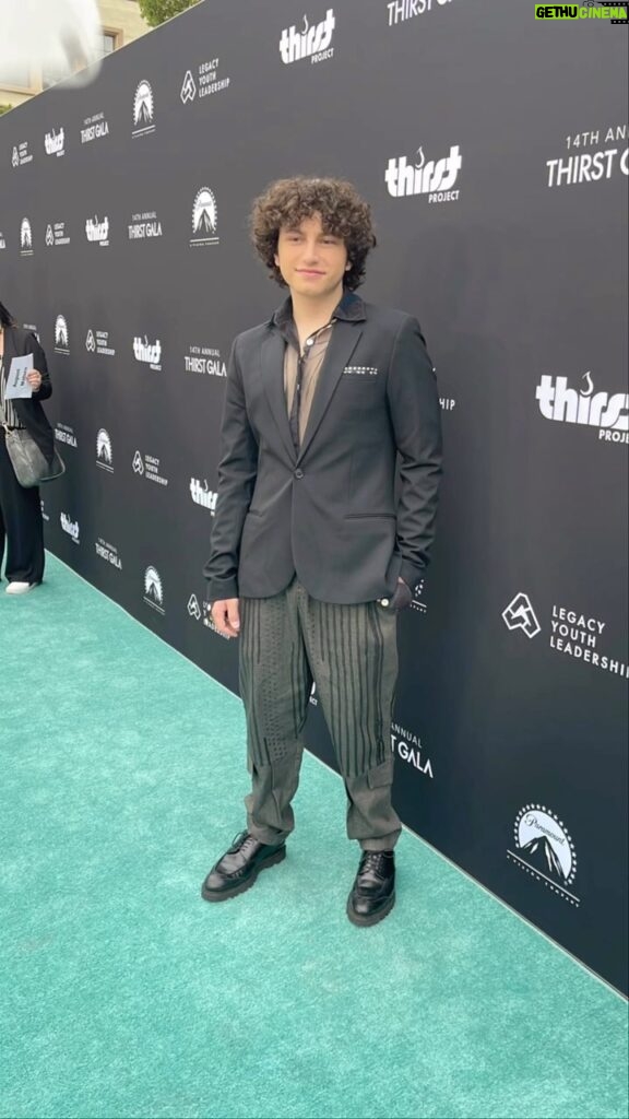 August Maturo Instagram - Was an honor to attend the 14th annual @thirstproject #ThirstGala last night. Thirst Project is the world’s leading YOUTH water activism organization founded by @sethmaxwell1. The Thirst Project is a powerful movement of high school and college students who build freshwater wells in developing nations and impoverished communities to provide people with safe, clean water, because clean drinking water is a human right! I’m excited to become involved in this project and encourage everyone reading this to do the same. Together we can end this crisis! Thank you @mike_manning_ for inviting me. Styling: @styled.by.chloee Jacket @drtlife Top @maisonaudmi Pants @charlesandron Shoes @jb_rautureau Paramount Pictures Studios
