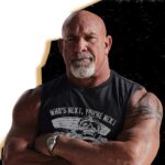 Bill Goldberg Instagram - THE TIME IS NOW!!! Run over to @bunkerbrandingco NOW to get my 1st post @wwe #wrestling T’s and other #merchandise !!!!!!!!!!! @goldbergsgarage #musclecar merch as well!!!! #spear #jackhammer #whosnext #tshirt #hats #stickers #letsgo #auto #fitness #training #swag #hotrod @dodgeofficial @goldbergsgarage #muscle #automotive