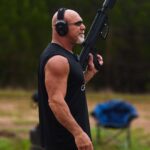 Bill Goldberg Instagram - #zombiehunter with a can! 😂😁 😤#pewpew #shotgun #firearm #keltec #spear #jackhammer #whosnext #firepower #texas #rangeday #gunsofinstagram #movieguns #videogameguns