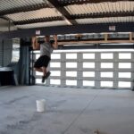 Bill Goldberg Instagram - #multitasking at its best! While @bendpak continues install of the worlds baddest 6 car lifts, I figured I’d get a few pull-ups in 😉 Always take time to get in a set!! @c.t.ali.fletcher @_nittotire @magnaflow @hre_wheels @xpel @metrongarage #spear #jackhammer #whosnext @wwe @dodgeofficial #workout #training #dodgegarage #hemi #garagesofinstagram
