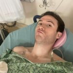 Brandon Calvillo Instagram - Hi. If ur wondering why I look cute as hell in the first photo it’s because I’m currently recovering from my SECOND HEART SURGERY in a year. That’s right, SECOND. Real fun stuff! The inside of my chest feels like the devil shat in it and I can’t walk for a few days, but it’s all chill because I recently got into emotional support squishmallows and I just gotta say…I finally get it (this one’s name is Fritz). Anyway, I hope ur all having a happy, healthy day.