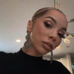 Brittany Renner Instagram - Out exploring and romanticizing every present moment more. My theme for 2024: “WHY NOT!?” Everyone and their endless excuses truly exhausts me! Too many whys, not enough why nots. It doesn’t need to “make sense” in your head if it makes sense in your heart ❤️‍🔥 Everything put on your heart is for a reason❗️ 📍 @deluxefundining Purse: @gbwhom Earrings: @lacebytanaya Deluxe Fun Dining