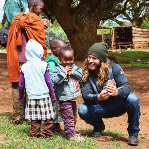 Brock O'Hurn Instagram - If you asked me what my favorite thing in the world was.. I'd tell you it's to make a child laugh or smile.

Even with a language barrier, kindness wasn't unnoticed. 
It seemed as if they had never seen a smartphone before and loved watching videos of us on it. So shy but still so curious.

I love this moment.