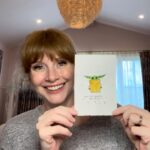 Bryce Dallas Howard Instagram - #MayTheFourthBeWithYou 💫💚 Swipe to see the making-of 👉🏻 ⁣⁣ ⁣⁣ #TheMandalorian #BabyYoda #StarWars ⁣⁣ ⁣⁣ [ID: Showing off her new Grogu watercolor painting, BDH makes a kiss face]