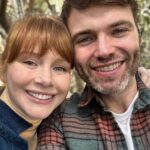 Bryce Dallas Howard Instagram - Spontaneous breakfast dates with @stealthgabel  >>>⁣ #BreakfastDate #WeekendVibes⁣ ⁣ [ID: Standing in front of lush green trees, BDH (left) and Seth (right) smile together after their breakfast date. BDH is swooning with how cute Seth is.]