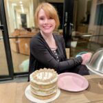 Bryce Dallas Howard Instagram - Thank you all for the birthday messages 🫶🏻 I wish I had the words to express how grateful I am for the outpouring of love and support as I enter my 42nd year!! You all were the bright spot in my day — what a special way to start this year ☺️⁣ ⁣ [ID: Outside on the patio, BDH smiles, absolutely excited to celebrate with a delicious gluten-free vanilla rainbow birthday cake.]