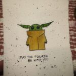 Bryce Dallas Howard Instagram - #MayTheFourthBeWithYou 💫💚 Swipe to see the making-of 👉🏻 ⁣⁣ ⁣⁣ #TheMandalorian #BabyYoda #StarWars ⁣⁣ ⁣⁣ [ID: Showing off her new Grogu watercolor painting, BDH makes a kiss face]