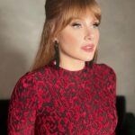 Bryce Dallas Howard Instagram - What a memorable night surrounded by friends and collaborators I so admire 🤩 Thank you @vanityfair & its fearless leader @radhikajones for including me. ⁣ ⁣ Over 20 years ago I got to intern at Vanity Fair so I know how much thought and care goes into creating a space for our community to celebrate — congratulations to all involved!! #VFOscars #VanityFairOscarParty⁣ ⁣ Thank you @quinnmurphy, @misterjasonlow, and @alex.schack for making me feel pretty. Dress by Alaïa — consignment never fails ♥️ ⁣ ⁣ 📸 3: @gettyentertainment⁣ & @vanityfair ⁣ [ID: BDH all glammed up and glowing with excitement on the Vanity Fair blue carpet. She wears a long red Alaïa dress with a red rose lace print and black pumps]