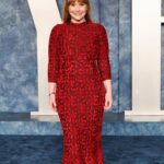 Bryce Dallas Howard Instagram - What a memorable night surrounded by friends and collaborators I so admire 🤩 Thank you @vanityfair & its fearless leader @radhikajones for including me. ⁣ ⁣ Over 20 years ago I got to intern at Vanity Fair so I know how much thought and care goes into creating a space for our community to celebrate — congratulations to all involved!! #VFOscars #VanityFairOscarParty⁣ ⁣ Thank you @quinnmurphy, @misterjasonlow, and @alex.schack for making me feel pretty. Dress by Alaïa — consignment never fails ♥️ ⁣ ⁣ 📸 3: @gettyentertainment⁣ & @vanityfair ⁣ [ID: BDH all glammed up and glowing with excitement on the Vanity Fair blue carpet. She wears a long red Alaïa dress with a red rose lace print and black pumps]