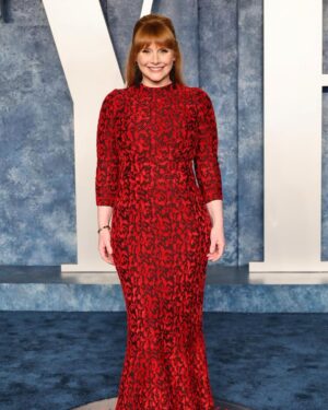 Bryce Dallas Howard Instagram - What a memorable night surrounded by friends and collaborators I so admire 🤩 Thank you @vanityfair & its fearless leader @radhikajones for including me. ⁣
⁣
Over 20 years ago I got to intern at Vanity Fair so I know how much thought and care goes into creating a space for our community to celebrate — congratulations to all involved!! #VFOscars #VanityFairOscarParty⁣
⁣
Thank you @quinnmurphy, @misterjasonlow, and @alex.schack for making me feel pretty. Dress by Alaïa — consignment never fails ♥️ ⁣
⁣
📸 3: @gettyentertainment⁣ & @vanityfair 
⁣
[ID: BDH all glammed up and glowing with excitement on the Vanity Fair blue carpet. She wears a long red Alaïa dress with a red rose lace print and black pumps]