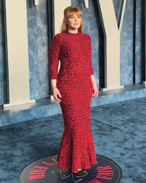 Bryce Dallas Howard Instagram - What a memorable night surrounded by friends and collaborators I so admire 🤩 Thank you @vanityfair & its fearless leader @radhikajones for including me. ⁣
⁣
Over 20 years ago I got to intern at Vanity Fair so I know how much thought and care goes into creating a space for our community to celebrate — congratulations to all involved!! #VFOscars #VanityFairOscarParty⁣
⁣
Thank you @quinnmurphy, @misterjasonlow, and @alex.schack for making me feel pretty. Dress by Alaïa — consignment never fails ♥️ ⁣
⁣
📸 3: @gettyentertainment⁣ & @vanityfair 
⁣
[ID: BDH all glammed up and glowing with excitement on the Vanity Fair blue carpet. She wears a long red Alaïa dress with a red rose lace print and black pumps]