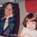 Bryce Dallas Howard Instagram - Mama, I love you — Happy Birthday you adventurous, empathetic, brilliantly creative, legendary matriarch of a woman! ⁣ [ID: A photo of Cheryl Howard (left) and BDH (right) circa 1985 sitting on an airplane. They smile, ready for their flight to take off. Cheryl wears a blue, green, and red striped blouse and BDH wears a white flower patterned blouse.]