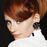 Bryce Dallas Howard Instagram - To my fellow redheads (all 2% of you), happy #NationalRedHeadDay! 👩🏻‍🦰 Hold your head high and celebrate your unique locks today (and make sure to stay out of the sun) 🧡 ⁣ ⁣ Hair: Creighton Bowman (@creightonbowman)⁣ Photo: KT Auleta (@ktauleta) for Dazed & Confused November 2005⁣ ⁣ [ID: BDH, with her bright red hair twirled in a bun, gives a coy look over her shoulder to camera]