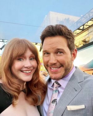 Bryce Dallas Howard Instagram - Big smiles for the birthday boy 😁 @prattprattpratt, over the last three movies and eight years together, we’ve become like family and that alone is a reason to celebrate. ⁣
⁣
I remember celebrating your 35th birthday in New Orleans near the end of filming the first movie and it is remarkable how much has changed in all that time — but not you my friend. You were the same then as you are now: a big fella with a heart of gold and shit-ton of talent, work-ethic, smarts, humility, and above all FAITH. You are a heck of a family man, a stellar friend, and the ultimate teammate. I have loved being in the Jurassic trenches with you, Chris. ⁣⁣
⁣⁣
You are sincerely one of the most thoughtful, kind-hearted, resilient, ethical, compassionate, brilliant, creative, sensitive, and open-minded human beings I’ve ever had the pleasure of encountering. You are the shot of adrenaline, optimism, and side-stitching humor I now miss whenever we aren’t in the same room. Thanks for all the laughs, deep lunges, pep-talks, and team spirit — Chris Pratt, I adore you. You are one of the greats 😊 Happy happy birthday!! 🎉✨⁣⁣
⁣⁣
[ID: The Setup vs. The Shot: Jurassic World Dominion edition. BDH & Chris take a selfie together at the LA Premiere of the movie — the first photo is of the duo taking the selfie and the second photo is the selfie]