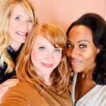 Bryce Dallas Howard Instagram - The sheer joy of being around these two 💗✨ ⁣ ⁣ [ID: The goddesses @lauradern and @dewandawise stand on either side of BDH to take a photo in front of Bryce’s favorite pink dinosaur wallpaper]