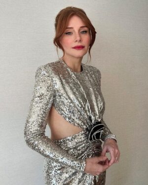 Bryce Dallas Howard Instagram - A magical night at the BAFTAs in London 🎭🪩⁣
⁣
Hair: @cwoodhair ⁣
Makeup: @kaymontano⁣
Styled by Publicist Extraordinaire: @alex.schack 
📸 1+6: @cwoodhair⁣
📸 2-5: @gettyentertainment @BAFTA ⁣
#EEBAFTAs⁣
⁣
[ID: Arriving on the red carpet with her hair in a relaxed up-do, BDH wears a silver sequined long-sleeve dress from @newarrivals.co with a cut-out around the waist ending with a black rose. Paired with the dress are a pair of black @maisonvalentino platform heels and a silver beaded bracelet & ring from @bulgari.]