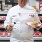 Buddy Valastro Instagram - Make this Thanksgiving unforgettable with my Every Buddy’s Fall cake, three desserts in one, now available @walmart 🦃🎂Dive into layers of creamy spiced maple buttercream, pumpkin cheesecake, apple crumb, and pecan pie. It’s a festive flavor explosion perfect for your holiday table! 🍁🍂 #CarlosBakery #Thanksgiving #ThanksgivingTreat #WalmartFinds #Walmart #Bakery #Cake