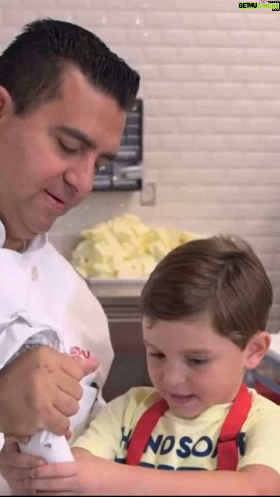 Buddy Valastro Instagram - #throwback to making this delicious cake with my son Carlo! 🎂🧑‍🍳 There’s nothing more special than some quality father-son time! ❤️#cakeboss #fatherhood #fatherandson