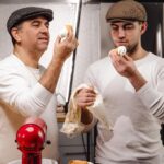 Buddy Valastro Instagram – Indulging in some #cannoli with my mini-me @buddyvalastrojr_ #cannolis #cannolitime #cakeboss #carlosbakery Hoboken, New Jersey