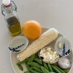 Cameron Diaz Instagram - Hey ya’ll just cookin a summer snack. It’s a quick pan roasted corn and fresh pea salad with feta cheese and a champagne orange & garlic vinaigrette.. Pairs well with @avaline white wine !! Hope you enjoy! . Ingredients : -1 ear of corn 🌽 -handful of snap peas -Feta Cheese (crumbled) -1/2 orange -1garlic clove -champagne vinegar -olive oil -@maldonsalt (not a paid advertisement) I just LOVE IT!!