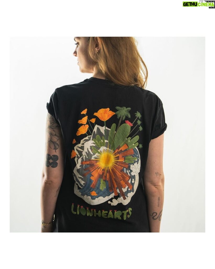 Cameron Monaghan Instagram - Introducing Lionhearts LA Lionhearts is a seasonal release of a tee-shirt, each one designed by a different Los Angeles-based artist. 20% of proceeds will go to California-based charities, with the remainder covering overhead and being put into a fund specifically for personal independent film projects. First up is a design by @nilafaith Nila is a tattoo and visual artist based in Los Angeles. She is also a personal friend and I have known her as a kind, spirited person with a strong sense of self. Lionhearts is about embracing our individual voice and expressing fearlessly, and Nila felt like a perfect fit for this reason. All shirts will be printed in association with @EverpressHQ Everpress is a UK-based company with an eye on sustainability. All shirts are made-to-order which reduces waste and manufacturing byproduct. Everpress places emphasis on sourcing from ethically-accredited suppliers. They comply with strict ethical and environmental standards. All profits will be donated to charity as follows:  5% - P.S. Arts 5% - Wildlife Conservation Network 5% - LA Food Bank 5% - Planned Parenthood LA  Lionhearts has an attitude of wanting to support a better world, not only for now, but for the future. Wildlife conservation to provide biodiverse ecosystems for future generations. Arts education so that children can be exposed to the beautiful and healthy outlet of creativity. The food bank, so that families do not go hungry. And Planned Parenthood, to provide sex education and so that parents can better choose when they would like to bring a child into this world, and do so with a safer start. These organizations have been vetted using Charity Navigator and picked specifically because they seemed to have transparency in their financials. We have also specifically chosen all California-based organizations. To find out more, visit the link in my bio, or head to lionheartsLA.com