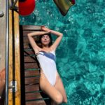 Camila Sodi Instagram - Esta soy yo gozando 🤍 Gozando poder descansar un poco después de tanto trabajo , gozando a mis hijes , gozando mi cuerpo echando hueva al sol , gozando mi libro del verano, el color del agua , el planeta increíble en el que vivimos … 🤍Gozando la vida que se vaaaa 🤍 💘 Estoy enamorada de esta isla 💘 Menorca, Balearic Islands, Spain