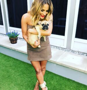Caroline Flack Instagram - We got you when you were so small. And we carried you all the way home in a blanket. When I took you for your first walk it was like walking a slug.....you will forever think that ANY rug is a pee pad... and you run at all children in the street because you think they are your mates because they are the same size as you. You stare at me when I’m in the bath and bark at me until I finsh my dinner... you will follow me around like my shadow and you HATE anyone washing you , ..you do more poos than anyone or anything and you snore louder than a giant ... . but ... you kiss my face if I cry and you sit by my side if someone is horrible to me.... ...you’re not like other dogs and I’m not just saying that because you are mine... other dogs don’t kiss EVERYONE they meet.. you do....happy 1st birthday Ruby xx
