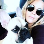 Caroline Flack Instagram - We got you when you were so small. And we carried you all the way home in a blanket. When I took you for your first walk it was like walking a slug.....you will forever think that ANY rug is a pee pad... and you run at all children in the street because you think they are your mates because they are the same size as you. You stare at me when I’m in the bath and bark at me until I finsh my dinner... you will follow me around like my shadow and you HATE anyone washing you , ..you do more poos than anyone or anything and you snore louder than a giant ... . but ... you kiss my face if I cry and you sit by my side if someone is horrible to me.... ...you’re not like other dogs and I’m not just saying that because you are mine... other dogs don’t kiss EVERYONE they meet.. you do....happy 1st birthday Ruby xx