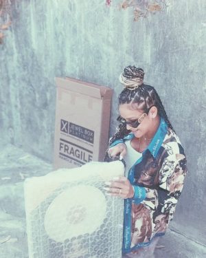 Cassie Ventura Instagram - Frankie said, “it’s Mommy Elsa!” I’ll take it! Anything that makes me cooler to her 🧊❄️

Now that I have your attention 😜please swipe for something I’m just soooo beyond thankful for. 

When I told my attorney, @chrisbrownthelawyer that I never received my Platinum Plaque for ‘Me & U’ he couldn’t believe it and so graciously had one made for me. Thank you so much for reminding me to celebrate myself, Chris! This one was long overdue. Thank you to my love @alexfine44 for capturing me opening the plaque, I’m so glad I got to share that moment with you. I love you so much 🤍

& 9 MILLION followers!? Whew 😅 I appreciate you all! 💙 

📸: @solmazsaberi 
💄: @rokaelbeauty 
Look: @solomioswim