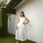 Catherine Tresa Instagram - My dress is as pure as my intentions. All white🤷🏻‍♀️ #WhiteDressConfessions #WittyInWhite #ChaosInCouture #mebeingme #fridayvibes Outfit @noie_noei Styling @archamehta Styling team @rashmi_angara @jainshreyaa8 Makeup @sakpalnilesh267 Hair @priyanka_sherkar1 Captured by @shivamguptaphotography Location courtesy @gallopsmumbai