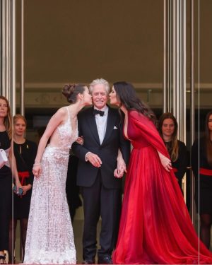 Catherine Zeta-Jones Instagram - Cannes! Cannes! What a soirée! To walk the iconic red carpet with my daughter @carys.douglas and my husband @michaelkirkdouglas as he receives his lifetime achievement Palm D’Or was a night I shall never forget, ever. Thanks always to @miss_kellyjohnson  @marywilesmakeup @stephanebodin @eliesaabworld @sarahflint_nyc @chopard @rogervivier