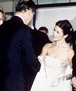 Catherine Zeta-Jones Instagram - God Save the King. God bless the Queen. All my love to King Charles and Queen Camilla♥️right now I am here in Britain, in my best robe, eating scones with clotted cream and drinking copious amounts of English breakfast tea as I await history being made. 🇬🇧🇬🇧🇬🇧🇬🇧🇬🇧🇬🇧🇬🇧🇬🇧🇬🇧🇬🇧