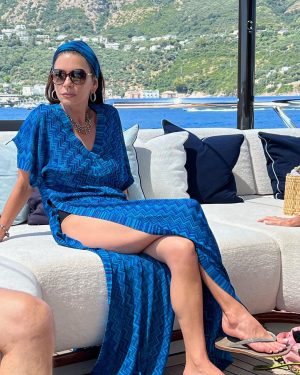 Catherine Zeta-Jones Instagram - Me in Capri, with my friend’s knee💙that’s amore😂pic by  @romcaz