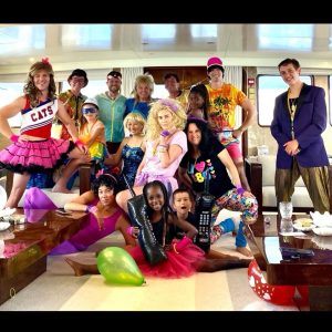 Charlize Theron Instagram - Well I never got to go to prom, but this year for my bday my friends decided to change that. I love these humans more than words can describe. Only they could know that an 80s prom murder mystery party on a boat is my literal dream birthday. What a family, what a night 💜