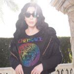 Cher Instagram - Just hanging @ home rocking my new #Chersace t-shirt celebrating #LGBTQPride (And proceeds going to #GenderSpectrum ❤️) 🏳️‍🌈⚧💅😎