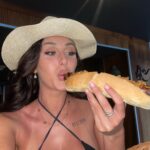 Chloe Veitch Instagram - What my night consisted of. Sausage. Sweat & sore feet