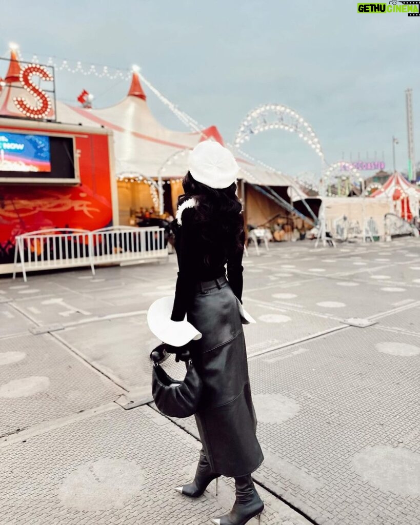 Christine Chiu Instagram - Winter wandering ❄️ London is a different kind of trip with kids 😅🎡🎠🎢🎟️🎄 #hydeparklondon #winterwonderland #actuallyquitefun Hyde Park, London