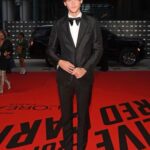 Christopher Briney Instagram - dalíland premiered at tiff this weekend and i could not be more proud of it. thank you to all of the wildly talented people who made this movie 💗 it’s beautiful suit: @gucci shoe: @louboutinworld jewelry: @cartier styled by: @daniela_viviana bts photos by: @klarawaldbergphotos @pressmanfilm @dalilandfilm