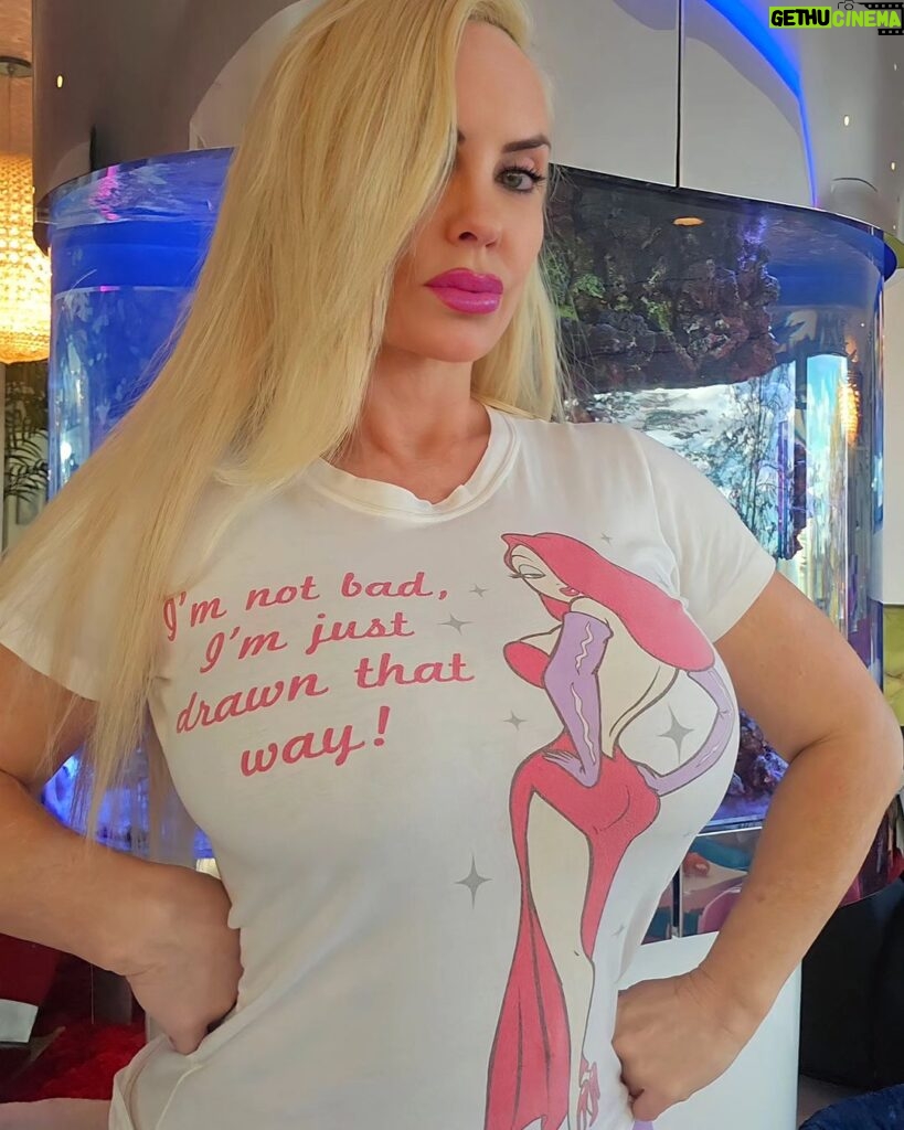 Coco Austin Instagram - When I wear this shirt in public alot of ppl stop me to read it and laugh.. it makes them smile😄 #jessicarabbit #rogerrabbit #oldiebutgoodie #oldshirt