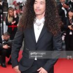 Cole Walliser Instagram - Cole, the Canadian Californian in Cannes with Campari. Attending my first Cannes premier, a big moment for the kid who used to watch art films Saturday nights in his bedroom in Canada. Also kind of surreal to have the full red carpet experience where photographers are yelling my name (thanks Daniele and Samina for yelling at me for these photos 😜😂🥰) Thank you Campari! #campari #camparicinema #cannesfilmfestival Cannes, France