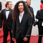 Cole Walliser Instagram - Cole, the Canadian Californian in Cannes with Campari. Attending my first Cannes premier, a big moment for the kid who used to watch art films Saturday nights in his bedroom in Canada. Also kind of surreal to have the full red carpet experience where photographers are yelling my name (thanks Daniele and Samina for yelling at me for these photos 😜😂🥰) Thank you Campari! #campari #camparicinema #cannesfilmfestival Cannes, France