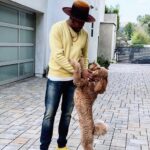 D-Nice Instagram - Love my buddy @theycallmecq. He brings so much joy into our household. Also, it was a perfect day to rock my @kennyburns X @puma sneakers and my Xmas @worthandworth hat.