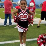 D.J. "Shangela" Pierce Instagram - #ProudUncle post … Last night lil’ Karli cheered her last game of the season. She’s in fourth grade now and she loves to dance, flip around the house, make TikToks and cheer … just like her #UncleDJ at that age 😁. Even tho she’s a firecracker at home, she sometimes struggles with a bit of social anxiety … but her mom told me she joined the cheer squad with her lil bestie in an effort to combat it. Me, her Mom, and her entire family are SO PROUD of her!! I’ll be rooting this lil one on for her entire life ❤️ She’s got the moves and I hope to help her (as I hope y’all will support her) to build her confidence every day. If anyone has any childhood social anxiety tips, please drop 👇🏾 Paris, Texas
