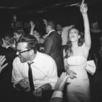 Dan Levy Instagram - My sister got married this weekend. This is absolutely not a photo of us screaming the lyrics to S Club Party on the dance floor. Love you, @sarahplevy. 📷 @copelandphoto